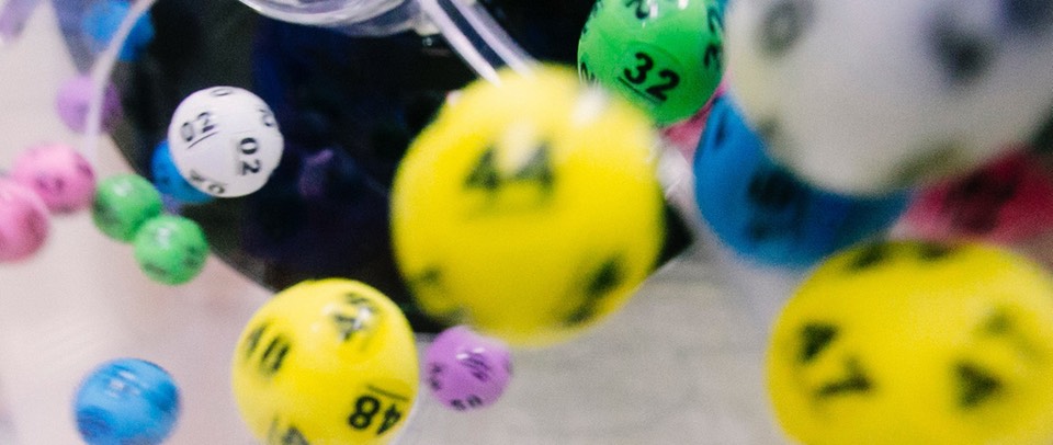 Lottery balls flying towards the viewer